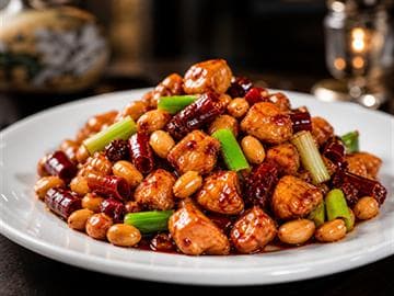 Curated Kung Pao Chicken plate sample with peanuts and clean diced chicken structure